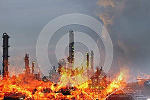 Double exposure of Fire and refinery plant , concept crisis a large oil refinery fire and emergency fire case.