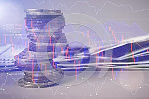 Double exposure of graph and rows of coins for finance and business concept. Finance and money exchange investment as concept