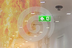 double exposure green emergency exit sign in hospital showing th