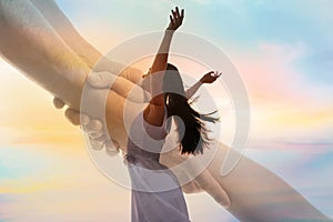 Double exposure of helping hand and woman enjoying summer day