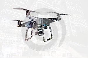 Double exposure. Hovering drone and city at night. Isolated.