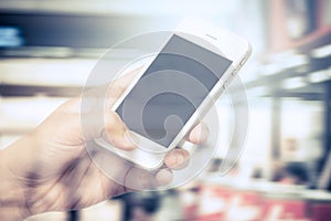 Double exposure image of woman using cellphone