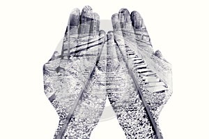 Double exposure of man hands and railway, in black and white