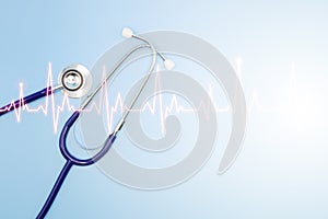 Double exposure of medical stethoscope and cardiogram isolated on light blue. Cardiac therapeutics assistance, pulse beat measure