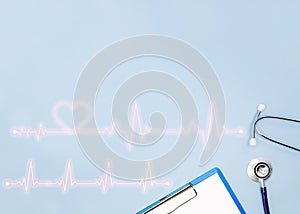 Double exposure of medical stethoscope and writing pad paper clip board isolated on light blue, pulse beat measure, arrhythmia