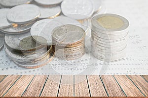 Double exposure of money coins stack for finance and banking concept.