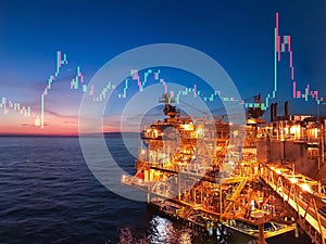 Double exposure of offshore platform with chart of stock trend for oil and gas industry business concept