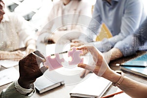 Double exposure of people with puzzle, cityscape