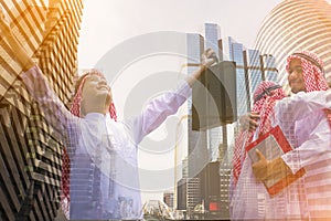 Double exposure picture.Picture mix  building city and Muslim Arab man.They are hug mean teamwork  and spirit beside  building bac