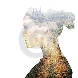 Double exposure portrait of beautiful girl in profile. Young woman and lanscape with olive trees