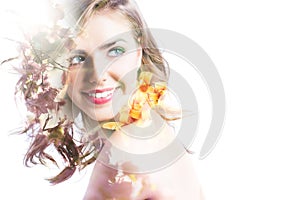 Double exposure portrait of beautiful woman, sunset sea and flowers.