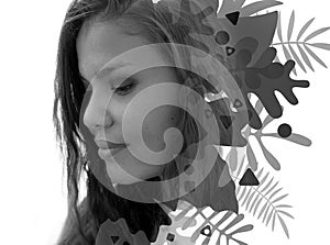 Double exposure portrait of a mixed-race woman combined with digital graphics