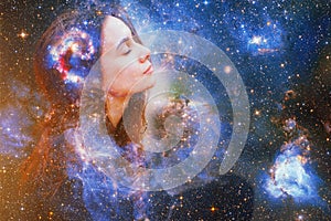 Double exposure portrait of a young woman close eye face with galaxy space inside head. Human inner peace, star light fire, life photo