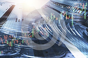 Double exposure of row coins city scape and stock market graph chart for economy and finance banking concept