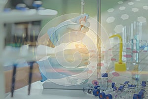 Double exposure of scientist is demonstrate the titration technique with graph