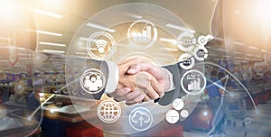 Double exposure of shaking hand business people for success deal on marketing online