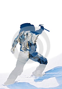 Double exposure: silhouette of a mountaineer celebrating the con
