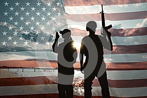 Double exposure with silhouettes of soldiers, American flag. Military service