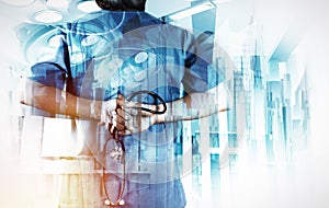 Double exposure of smart medical doctor working