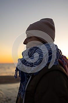 Double exposure and soft selective focus, portrait of a woman at sunset