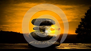 Double Exposure Stack Stone on Sunset Background Design Buddhism Nature Therapy Spa Massage,Concept for Aroma therapy Calm