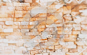 Double exposure of the stonewall from old bricks