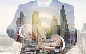 Double exposure of success businessman using smart phone