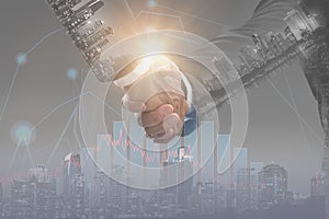 Double exposure-Successful collaboration concept CEO in business merger,businessman shake hand,making deal,agree to partner,stock photo