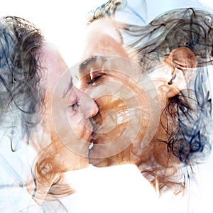 Double exposure of two blissful people close up embracing and be