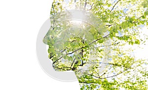 Double exposure woman profile with tree foliage photo