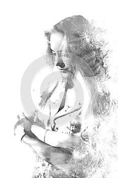 Double exposure of a young beautiful girl. Painted portrait of a female face.Black and white picture isolated on white background.