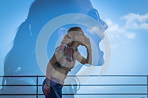 Double exposure of young woman shouting