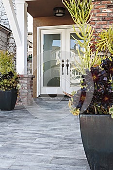 Double front door of a brick home