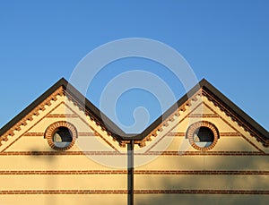 Double hip roof and bricks