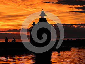 Double lighthouse in the romantic sunset