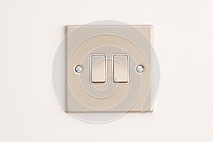 Double Lightswitch on a White Wall