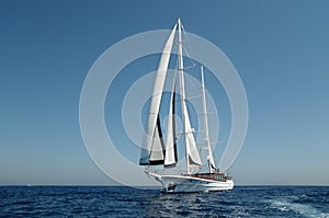 Double masted classical, sailing, luxury sailing yacht sailing in Aegean Sea.