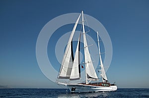 Double masted classical, sailing, luxury sailing yacht sailing in Aegean Sea.