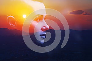 Psychology power of mind, human spirit, mental health, zen concept. Double exposure abstract portrait woman face silhouette sunset photo