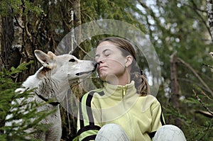 Double portrait of the beauty girl and husky dog