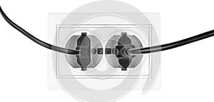 Double power European electric plug isolated on a white. Black electric cord plugged into a white electricity socket on white