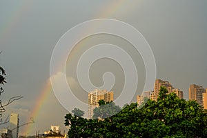 A double rainbow appeared over the city after the rain