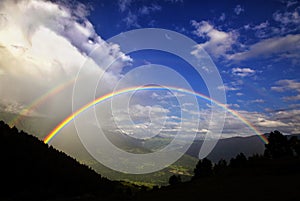 Double rainbow in the Caucasus mountains