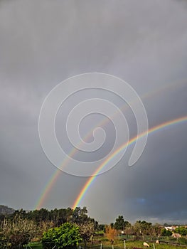 Double rainbow in the countryside