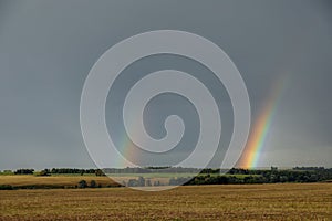 Double rainbow on the horizon