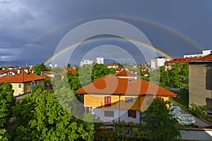 Double rainbow over the city