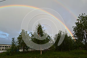 Double rainbow over the city in jule