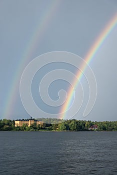 Double rainbow over Djurgarden island in Stockholm, Sweden in summer