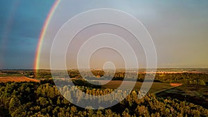 Double Rainbow Over Forest and Wheat Field