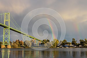 Double rainbow over river
